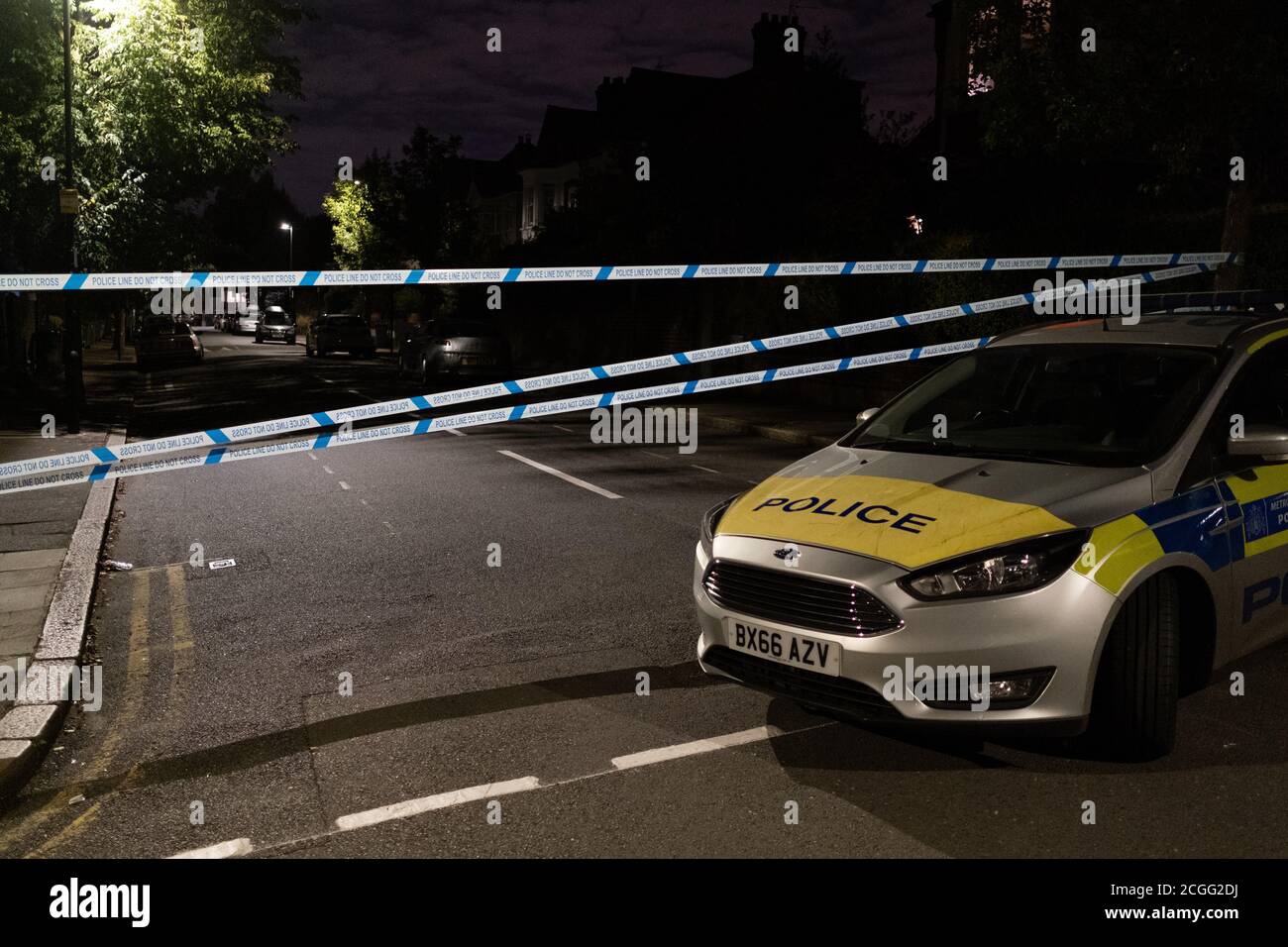 A Met Police car blocks  local roads surrounding Herne Hill and Carnegie Library, after shots were fired in a residential south London street, on 10th September 2020, in London, England. Stock Photo