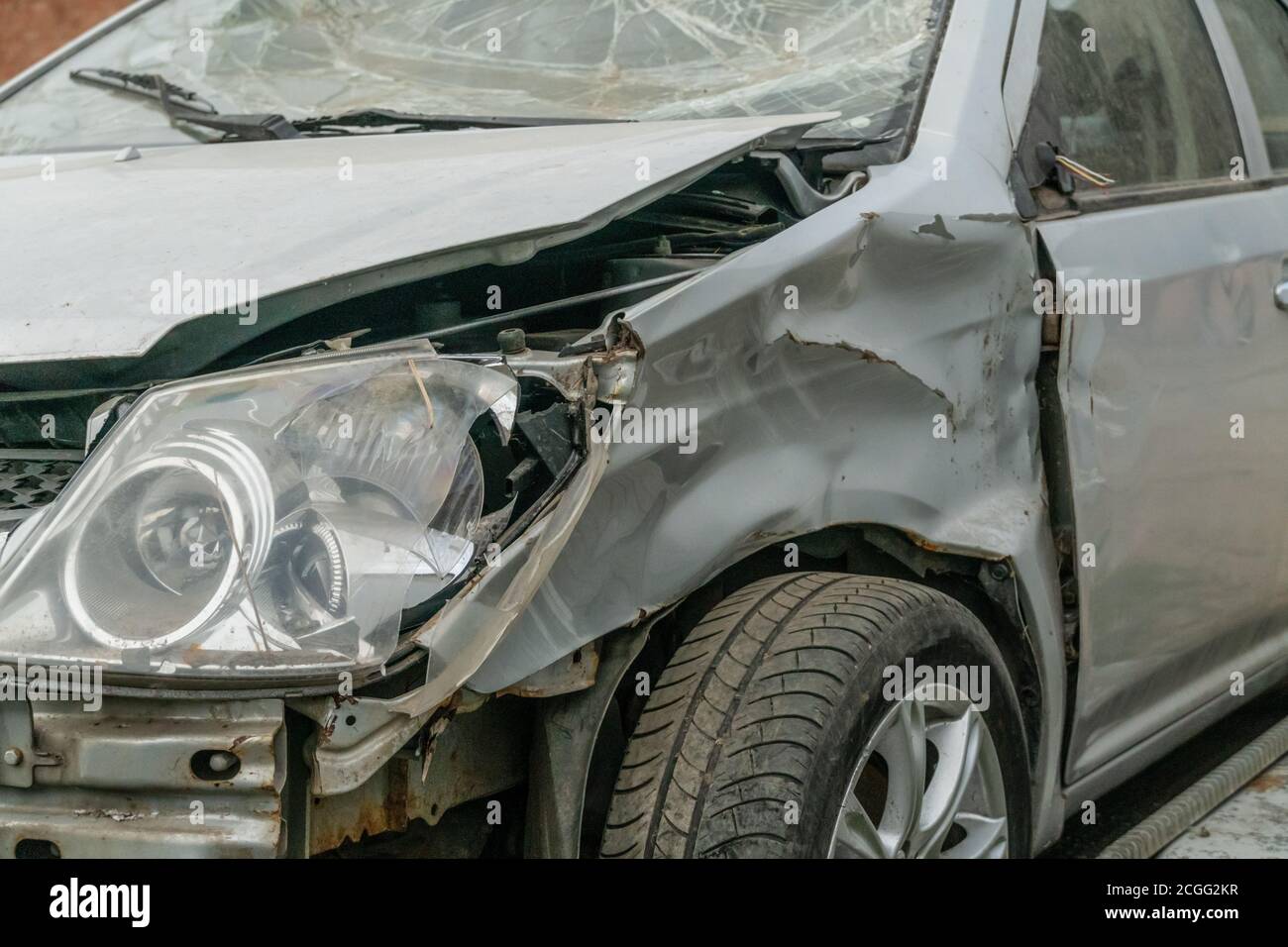 broken gray car close up. accident concept Stock Photo