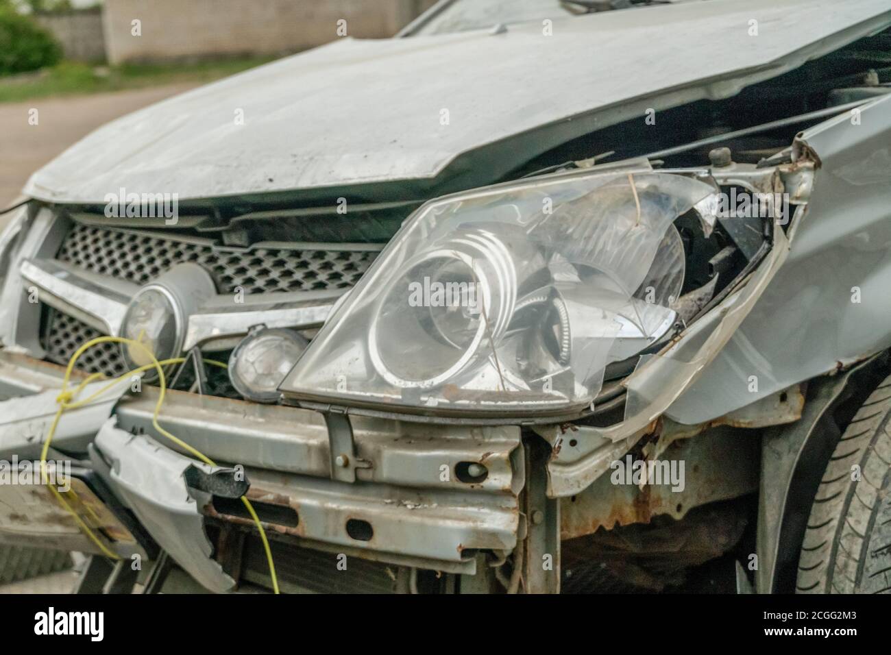 broken gray car close up. accident concept Stock Photo