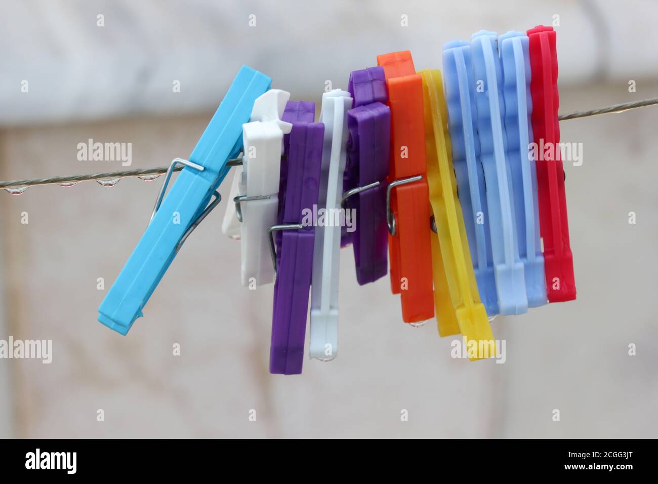 Colored Clothes Pins Clothes Line Rope Stock Photo Alamy