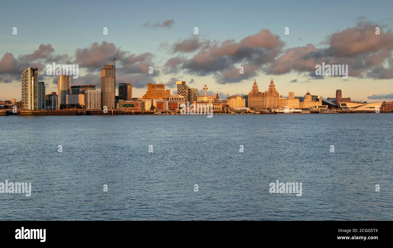 Liverpool skyline and River Mersey at sunset, Merseyside, England Stock Photo