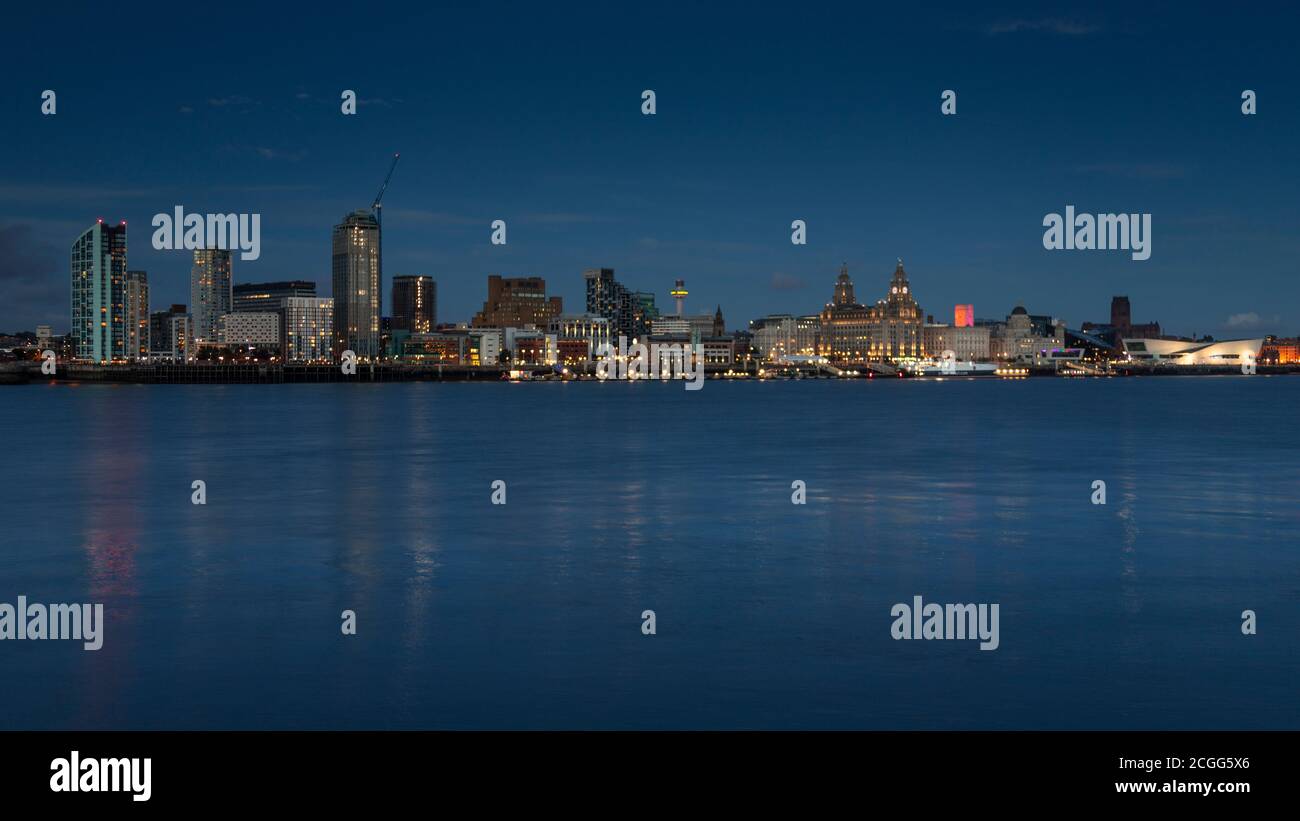 Liverpool skyline and River Mersey at twilight, Merseyside, England Stock Photo