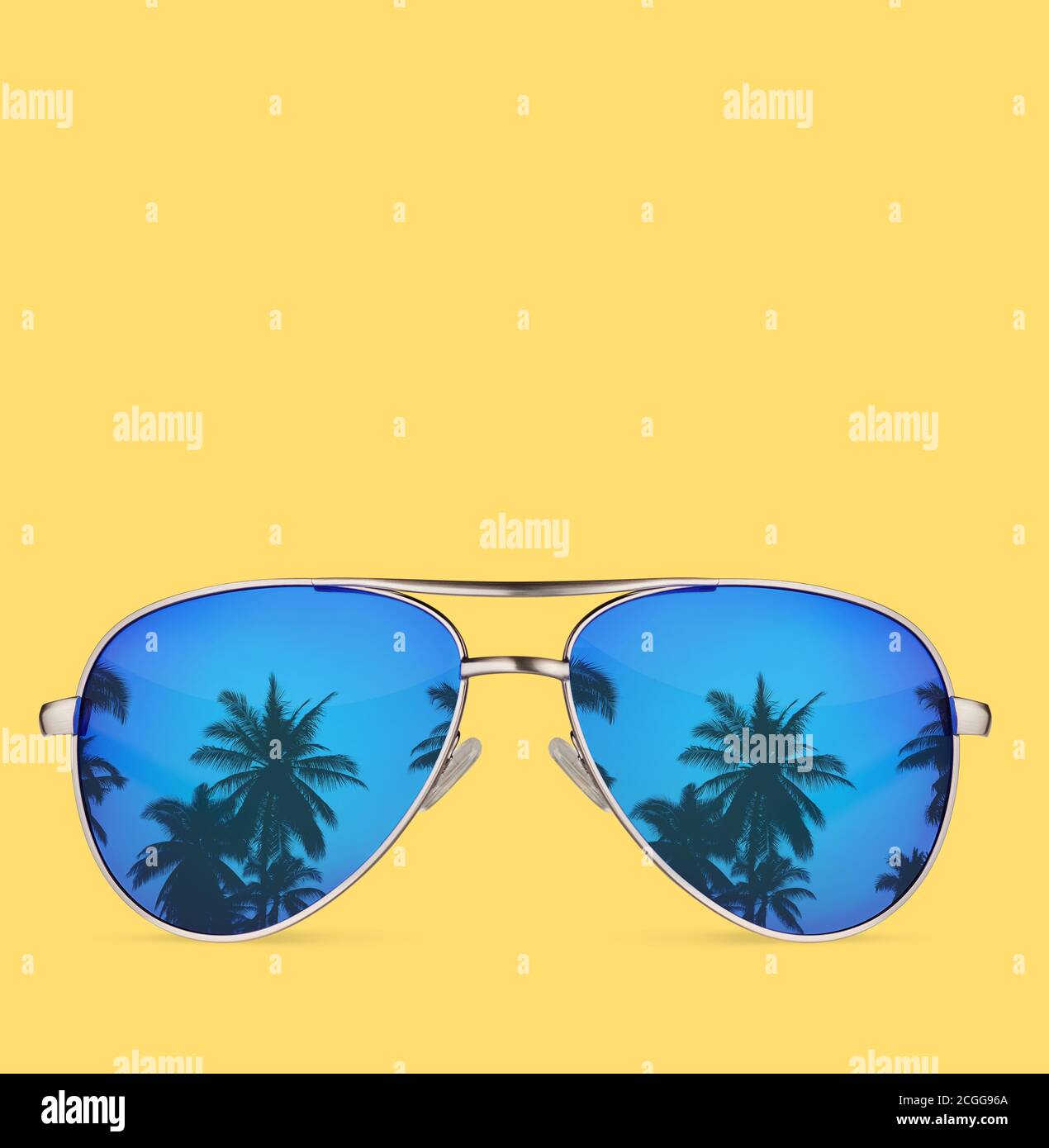 sunglasses with palms isolated on yellow background. Stock Photo