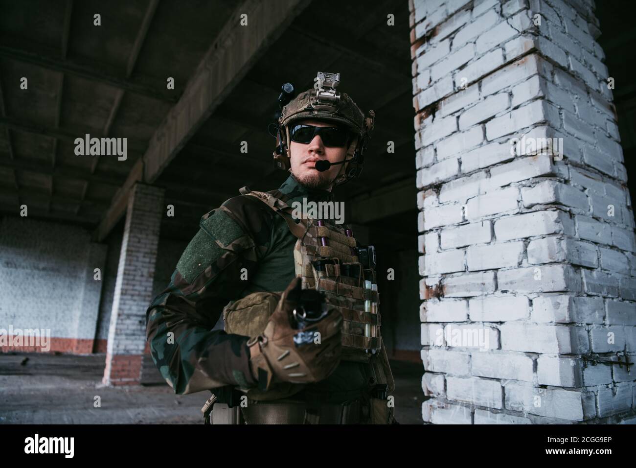 Front view close up of caucasian soldier with a rifle stand guard ...