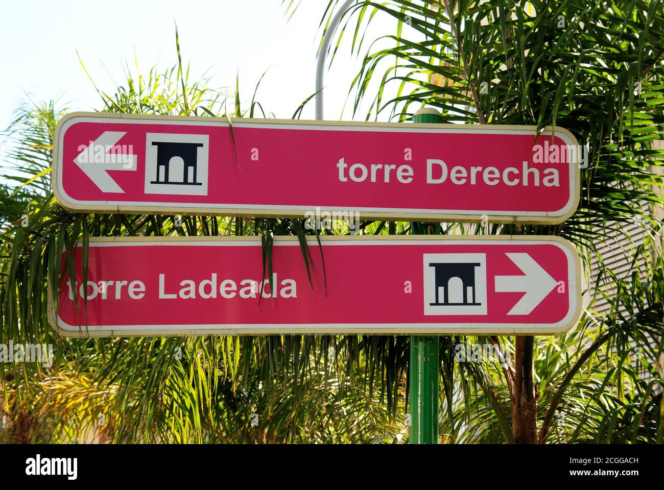 Two signs pointing in opposite directions for the old watchtower, the Torre Ladeada and the Torre Derecha, Lagos, Malaga Province, Andalusia, Spain, W Stock Photo