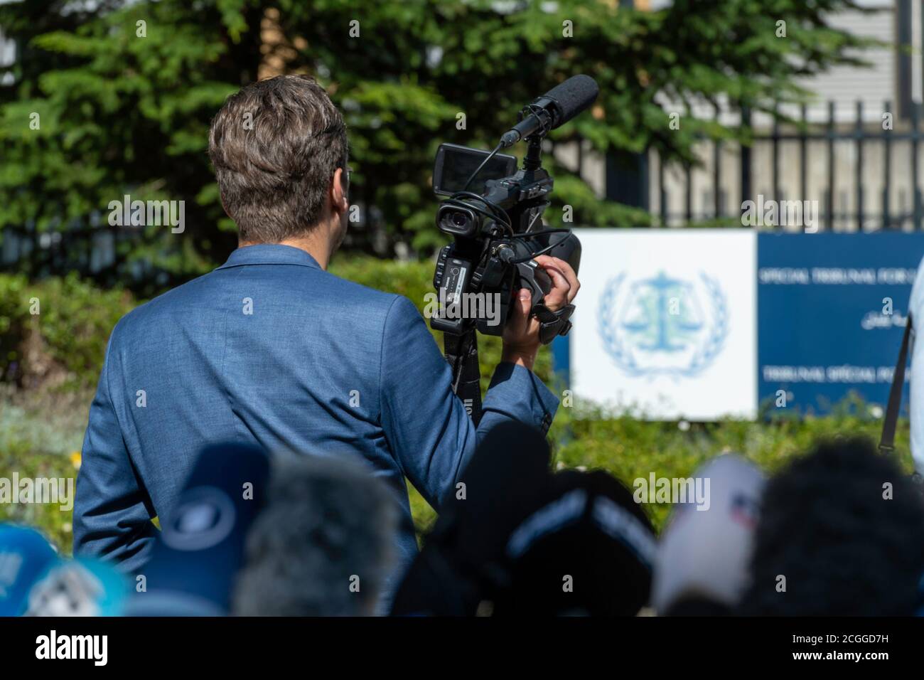 LEIDSCHENDAM, 18 August 2020 - Cameraman scouting and waiting in front the Special Tribunal for Lebanon, for the exit of Rafic Hariri, Lebanon ex-Prim Stock Photo