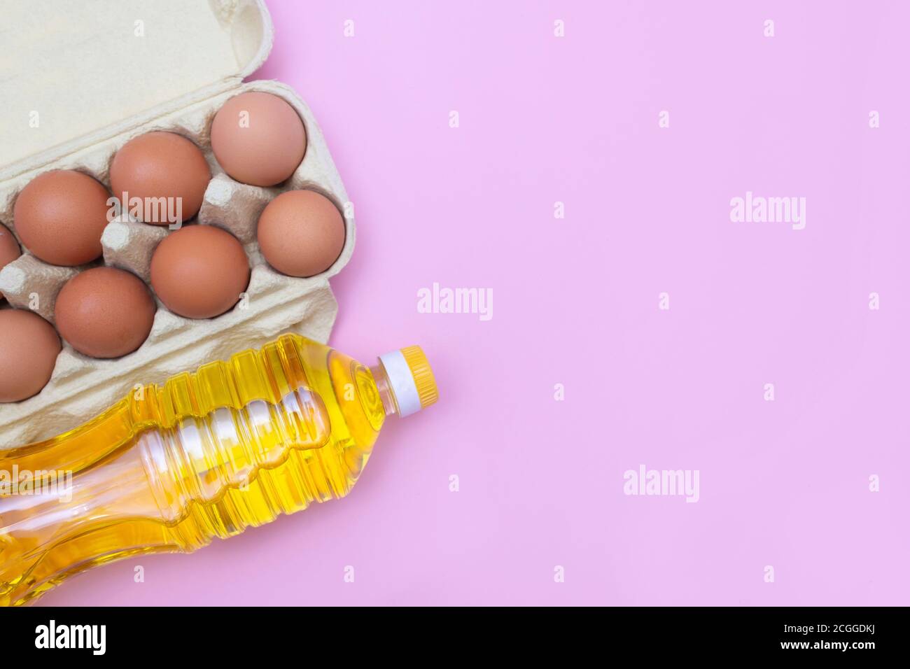 Fresh farm chicken eggs and natural sunflower oil Stock Photo Alamy