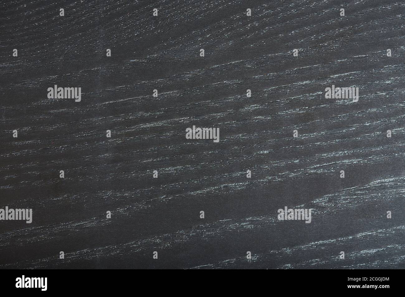 Texture of black timber macro close up view. Pattern of rough wooden surface Stock Photo