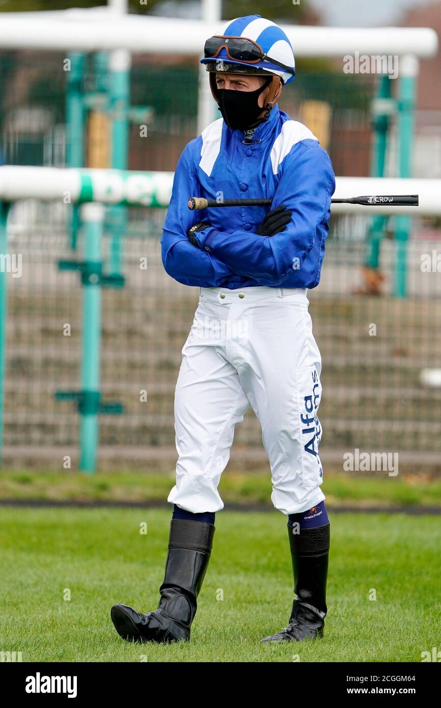 Jim Crowley in the parade ring during day three of the William Hill St Leger Festival at Doncaster Racecourse. Stock Photo