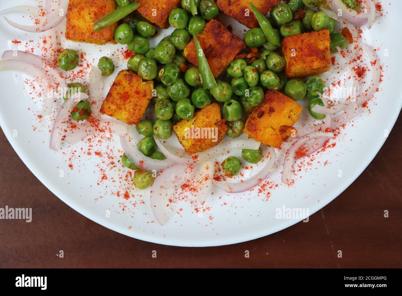 Tawa Paneer, Roasted Green peas and paneer salad, tawa fry, appetizer or starter Stock Photo