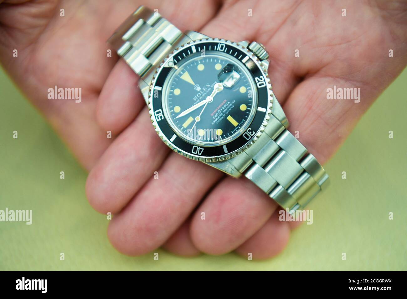 A 1969 Rolex 'Red' submariner at the Petworth Park Antiques and Fine Art Fair, at Petworth House in West Sussex. Stock Photo
