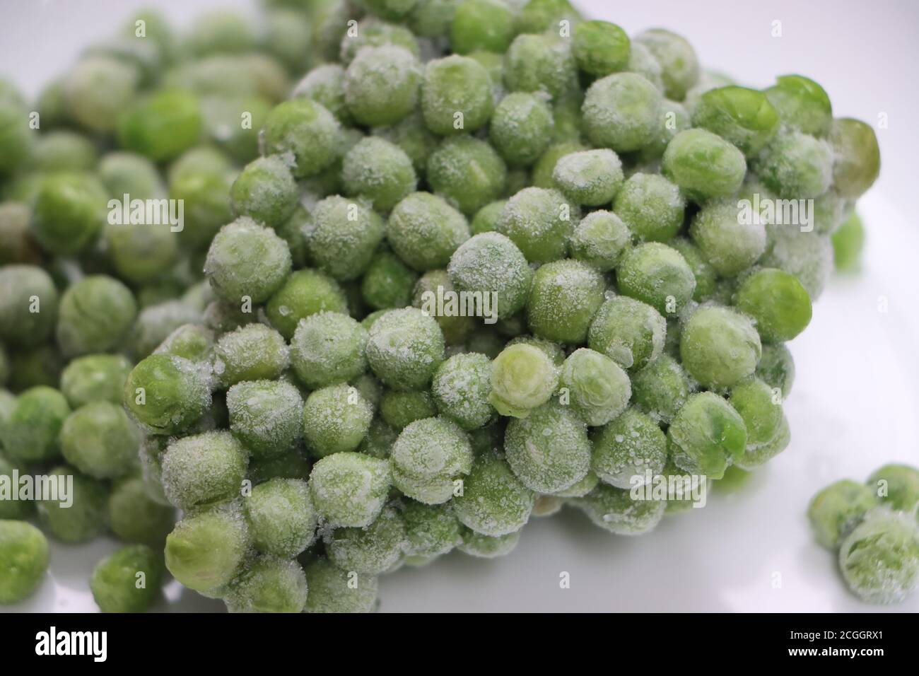 Frozen green peas, processed foods Stock Photo Alamy