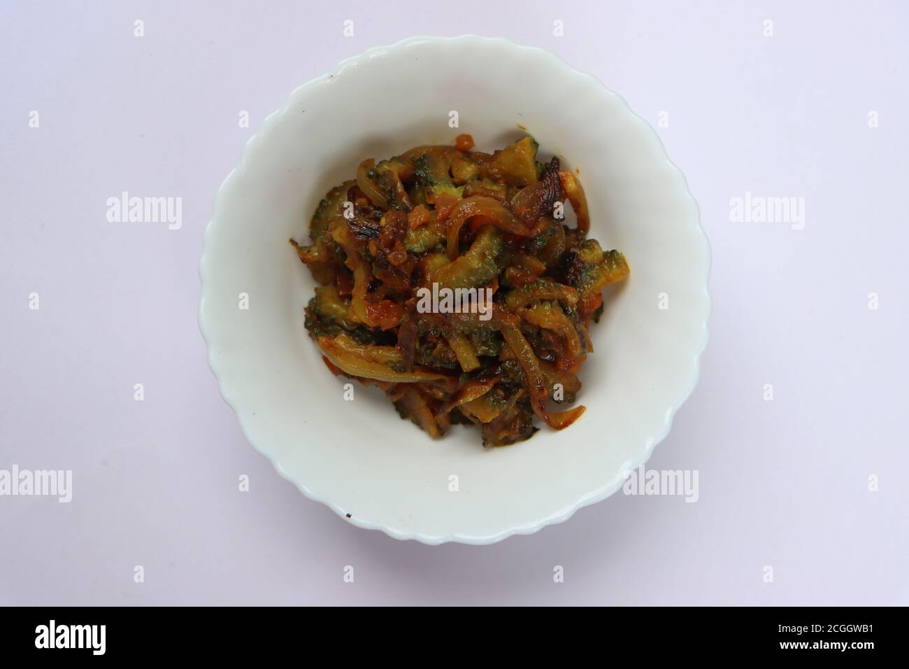 Bitter gourd fry, traditional curry in South India Stock Photo Alamy