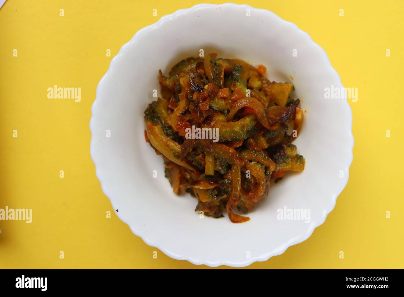 Bitter gourd fry, traditional curry in South India Stock Photo Alamy