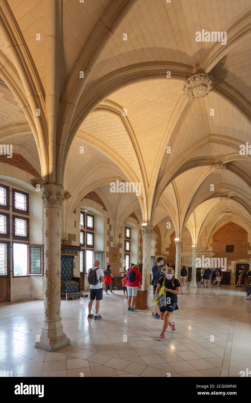 The Great Hall interior, one of the rooms in the medieval Amboise Chateau, with people; Chateau D'Amboise, Amboise, France Europe Stock Photo