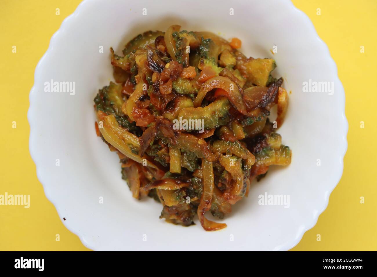 Bitter gourd fry, traditional curry in South India Stock Photo Alamy
