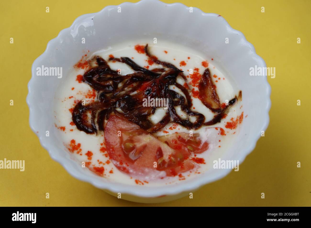 Fried onion raita, side dish or appetizer served with rice or biryani