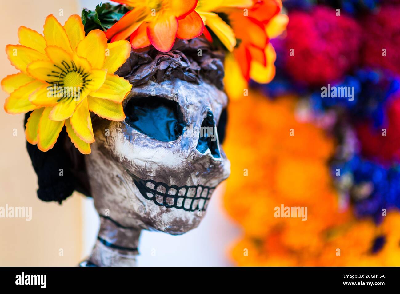 A flower-decorated skeleton figure is seen placed in the street during the Day of the Dead celebrations in Oaxaca, Mexico. Stock Photo