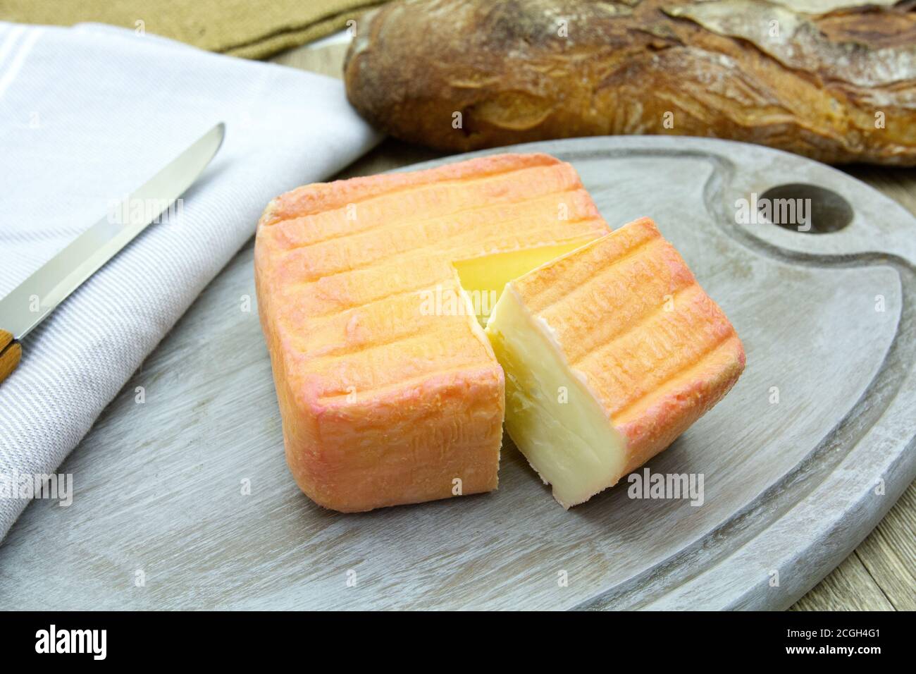 maroilles on a cutting board Stock Photo