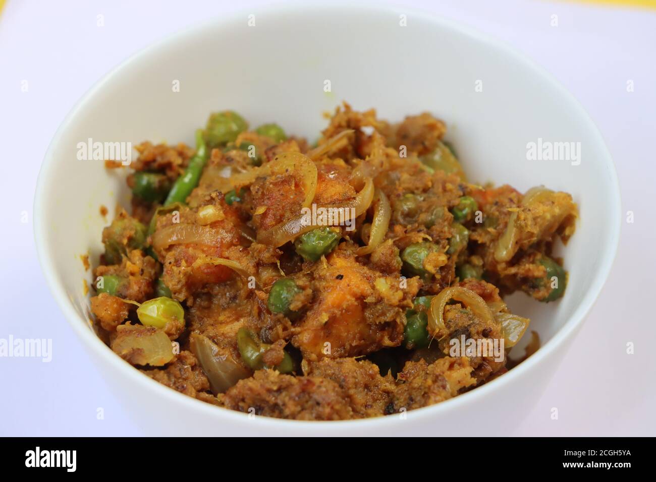 Paneer Sukka or Paneer mutter coconut masala, paneer green peas dry, curry made with cottage cheese,  Indian food Stock Photo