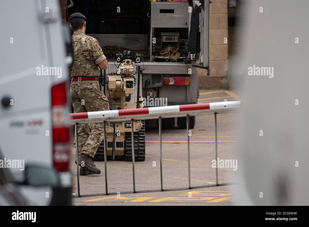 An army bomb disposal robot is used at Royal Mail depot in Bath, Somerset after the discovery of a suspicious package. Stock Photo