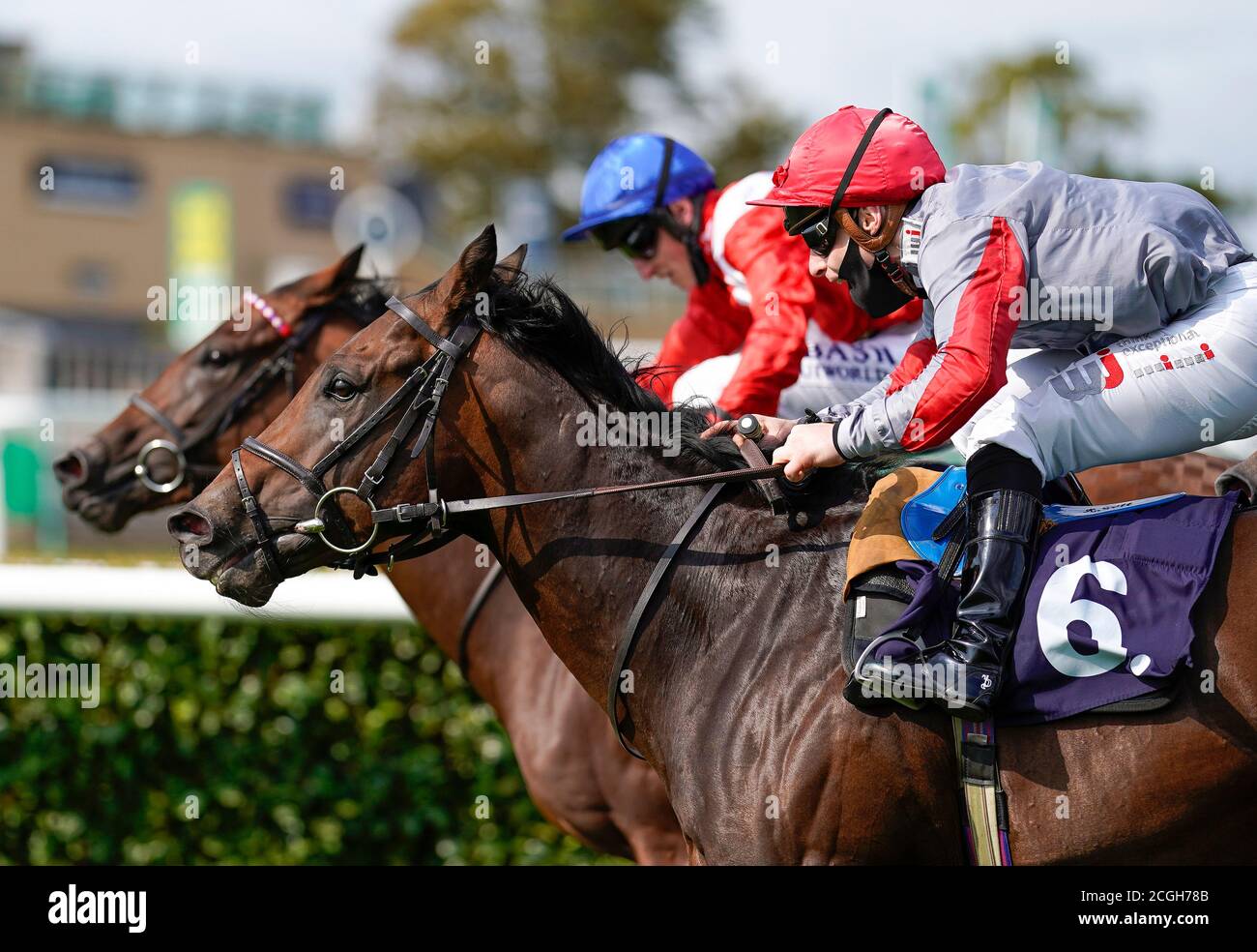 Rowan Scott riding Ubettabelieveit (right) win The Bombardier Flying Childers Stakes during day three of the William Hill St Leger Festival at Doncaster Racecourse. Stock Photo