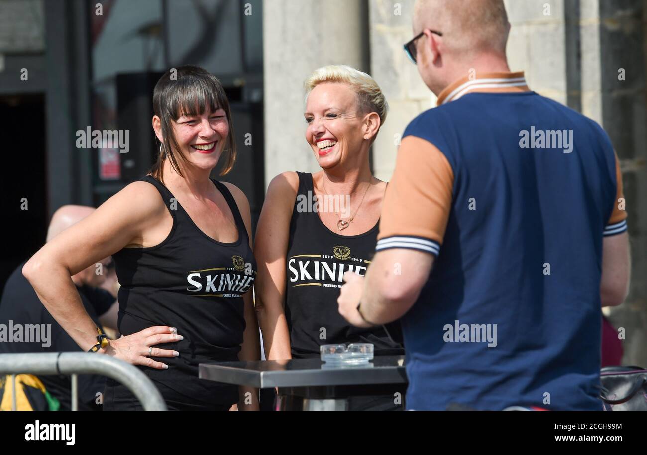 Brighton UK 11th September 2020 - Skinheads start to gather on Brighton seafront at the Volks bar for the 10th Great Skinhead Reunion 3 day event as the forecast is for hot weather to sweep across Britain over the weekend and next week : Credit Simon Dack / Alamy Live News Stock Photo