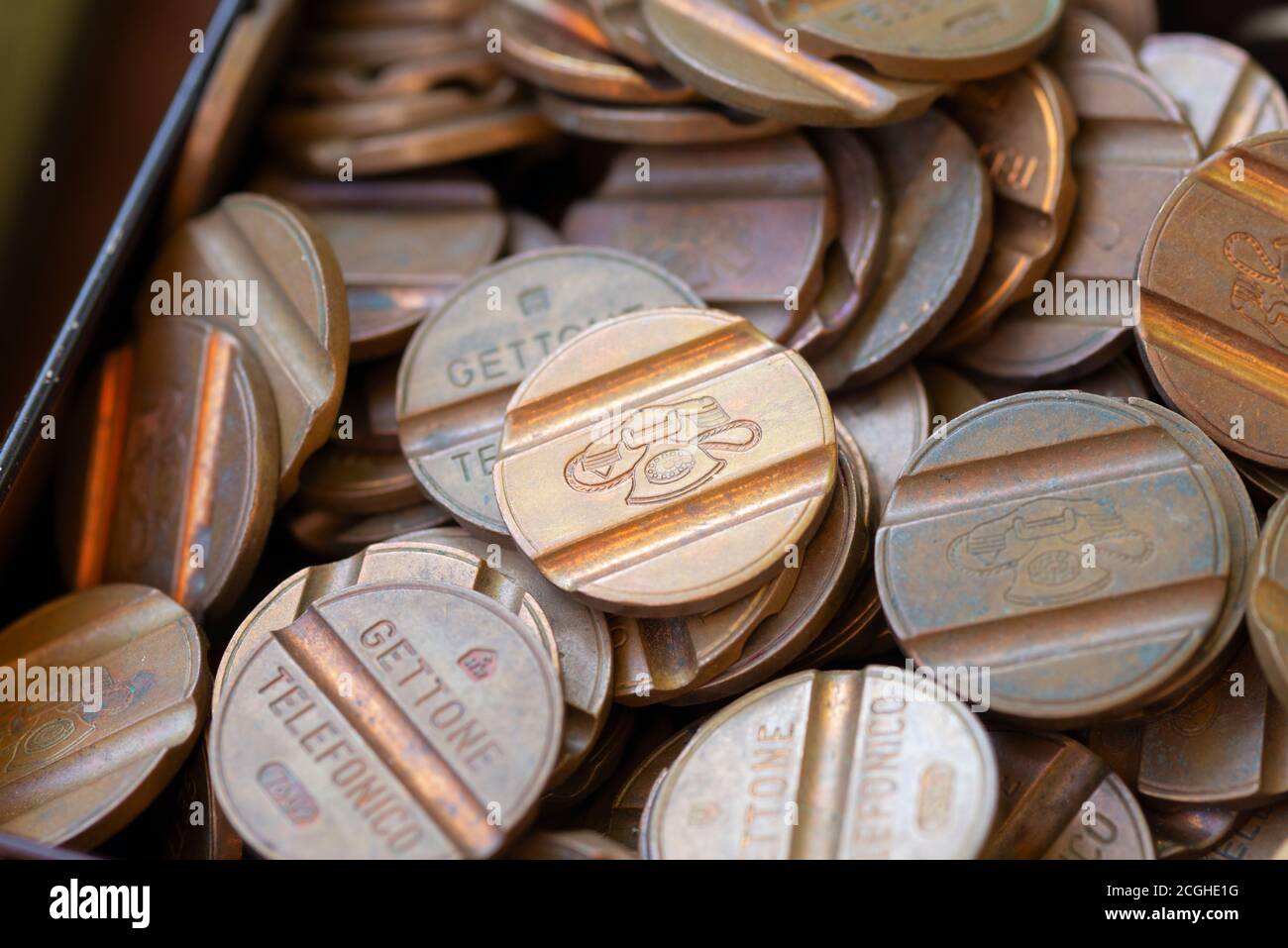Italy, Lombardy, Flea Market, Old Italian Telephone Token Coin Stock Photo