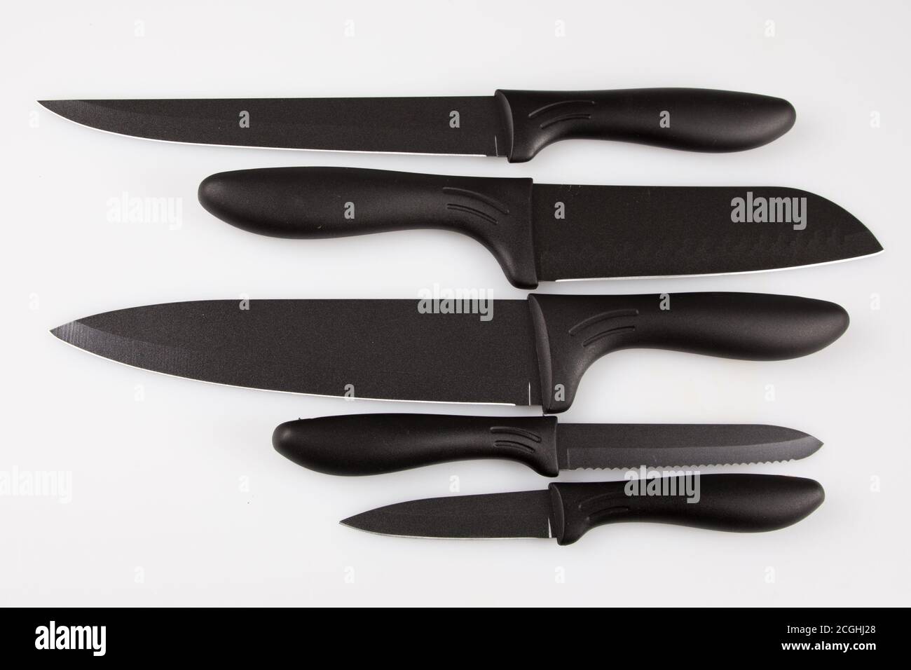 Kitchen black knives set isolated against white background Stock Photo