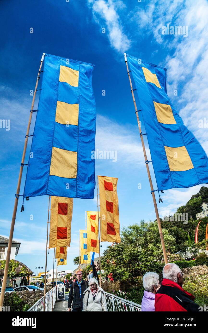 Festival flags at the Llama Festival held in the pretty coastal village of Lynmouth in Devon. Stock Photo