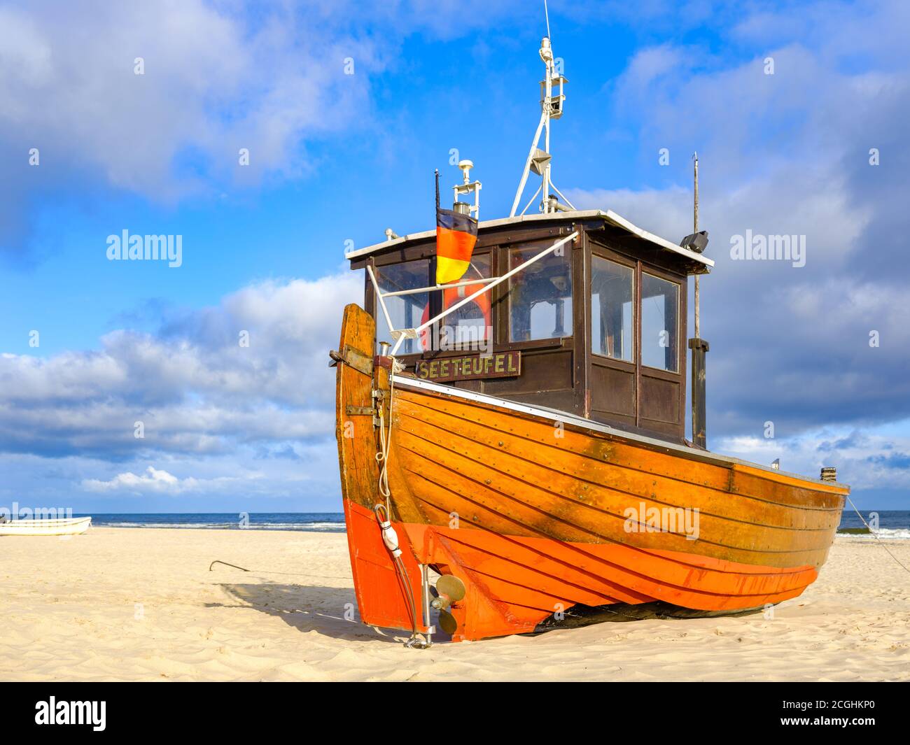 Boat at Usedom island, beach nearby Ahlbeck pier, coast of Baltic Sea Stock Photo