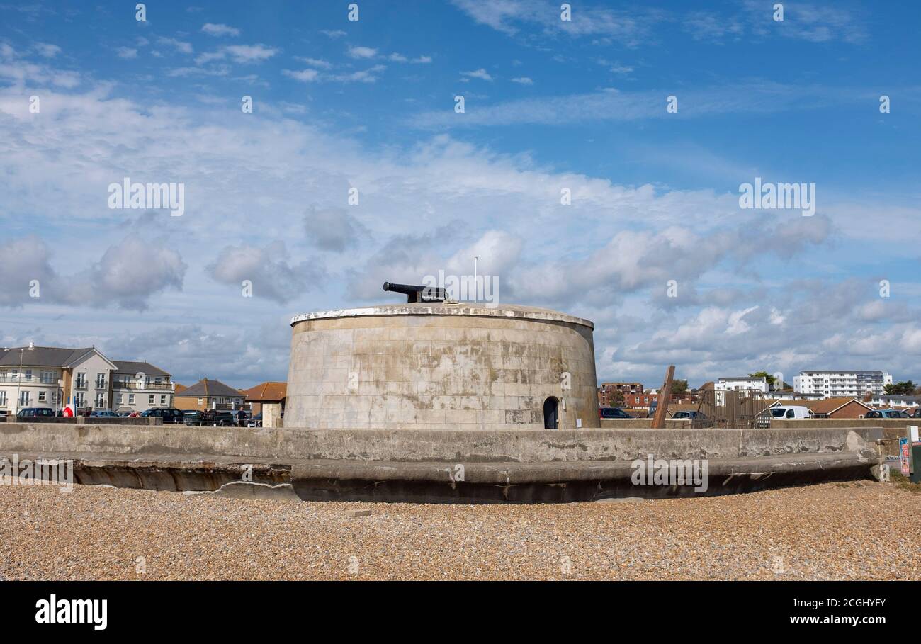 Seaford East Sussex town views and landscapes - The Martello tower on seafront . Seaford is a Cinque Ports which is a historic series of coastal towns Stock Photo
