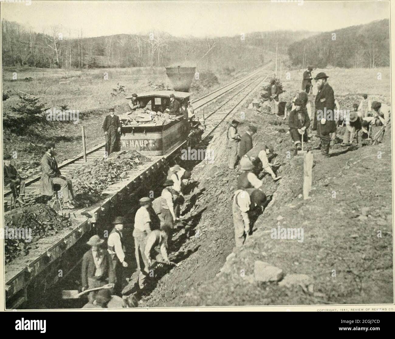 . The photographic history of the Civil War : thousands of scenes photographed 1861-65, with text by many special authorities . i ■ neview of nevii GENERAL HAUPT INSPECTING THE MILITARY RAILROAD L863 ::ene is near bull bun—general haupt stands it th K RIGHT -Till: ENGINE HAS BEEN NAMED U UK HIM On the embankment stands Genera. Haupt overseeing the actual «„rk he railroad. This ,., .graph give, an uuhca ,f ! , L no detail was too small for to ins, t. He ™ a graduate of the 0 1 States M.h,»ry Academy . - , He resigned his commissi after graduation 1 ente railroad serv in the B I - * « *- S —bfbr Stock Photo