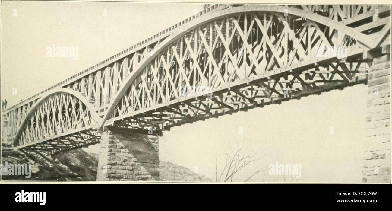 . The photographic history of the Civil War : thousands of scenes photographed 1861-65, with text by many special authorities . ffijjjj COPYRIGHT, 1911, RFVIEW OF REVIEWS Co. WHAT LINCOLN CALLED THE BEANPOLE AND CORNSTALK BRIDGE, BUILT OVER POTOMAC (REEK This famous beanpole and cornstalk bridge, so named by President Lincoln, amazed at its slim structure, was rushed up by totallyinexpert labor; yet in spite of this incompetent assistance, an insufficient supply of tools, wet weather and a scarcity of food, the bridge;was ready to carry trains in less than two weeks. First on this site had bee Stock Photo