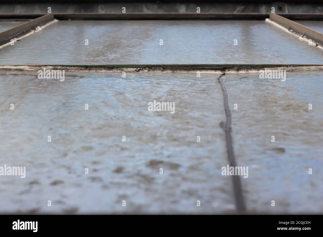 Gap between two glass plates in a abandoned greenhouse Stock Photo Alamy