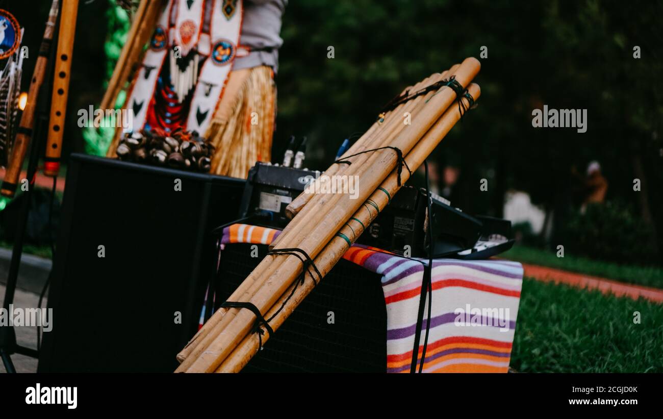 Bamboo pipe Indian style folk instrument public performance by