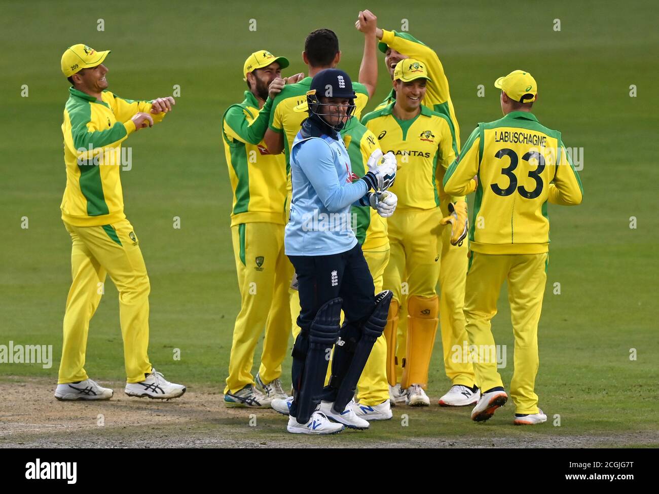 Australia's Josh Hazlewood (centre) celebrates catching England's Joe Root  (front) with team-mates during the first Royal London ODI match at Emirates  Old Trafford, Manchester Stock Photo - Alamy