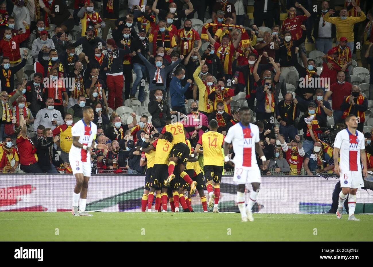 Ignatius Ganago of Lens celebrates his goal with teammates and the supporters during the French championship Ligue 1 football match between RC Lens (R Stock Photo