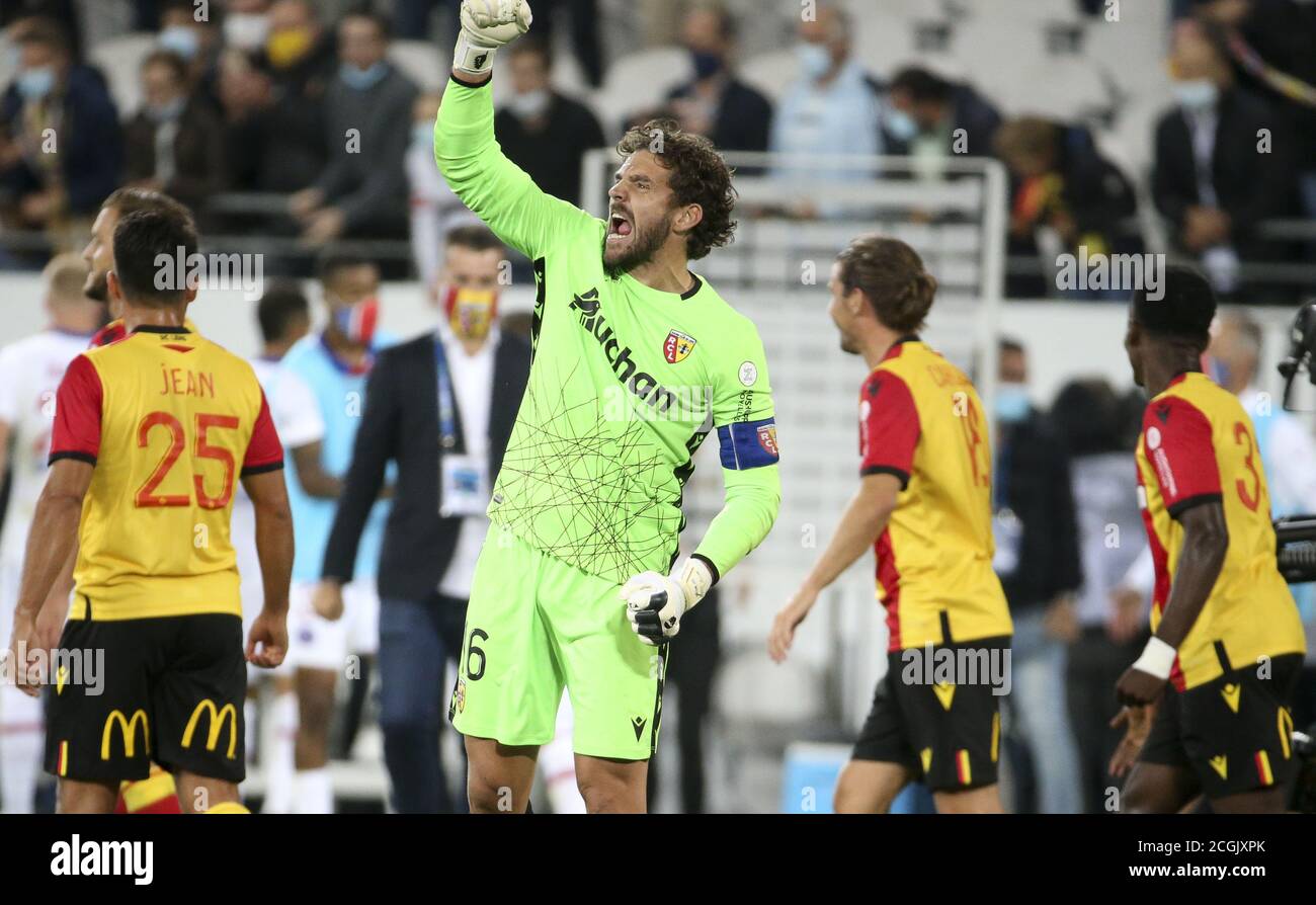 Goalkeeper of Lens Jean-Louis Leca celebrates with teammates the victory following the French championship Ligue 1 football match between RC Lens (Rac Stock Photo
