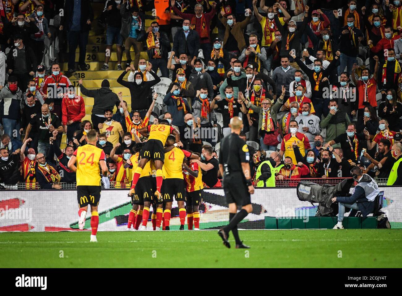 Ignatius Ganago of Lens celebrate his goal with teammates and the supporters during the French championship Ligue 1 football match between RC Lens and Stock Photo