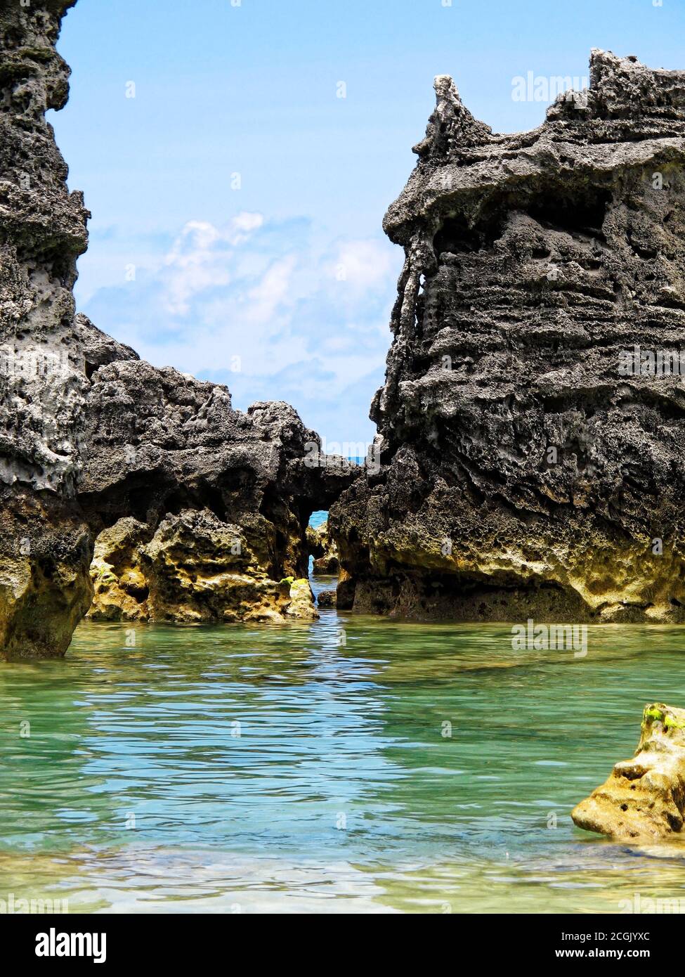 Tobacco Bay, clear aqua water, volcanic rock formation, arch, Atlantic Ocean, nature, marine scene, St. George; Bermuda Stock Photo