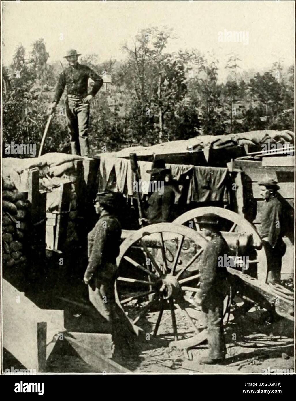 . The photographic history of the Civil War : in ten volumes . ABOVE DUTCH GAP—A GUN THAT MOCKED THE FEDERALS This huge Confederate cannon in one of the batteries above Dutch Gap bore on the canal that was beingdug by the Federals. Away to the south stretches the flat and swampy country, a complete protectionagainst hostile military operations. The Confederate cannoneers amused themselves by dropping shotand shell upon the Federal colored regiments toiling on Butlers canal. Aside from the activity of the diggers, the Army of the James had nothing to do. PART IITHE SIMULTANEOUS MOVEMENTS TO ATL Stock Photo
