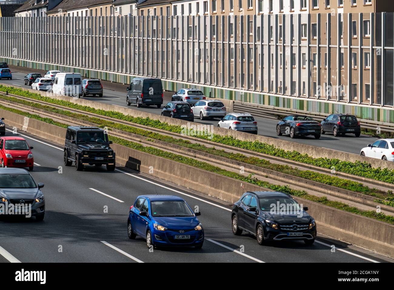 The freeway A40, Ruhrschnellweg, in Essen, residential buildings directly at the freeway, glass noise barriers, Dorstfelder Strasse, bus lane, at the Stock Photo
