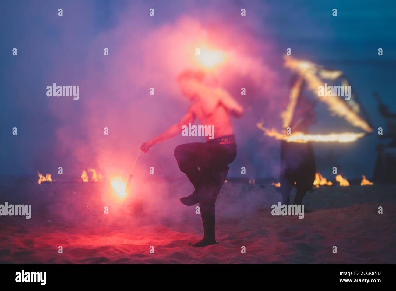 Group of fire artists fakir perform amazing show at night with