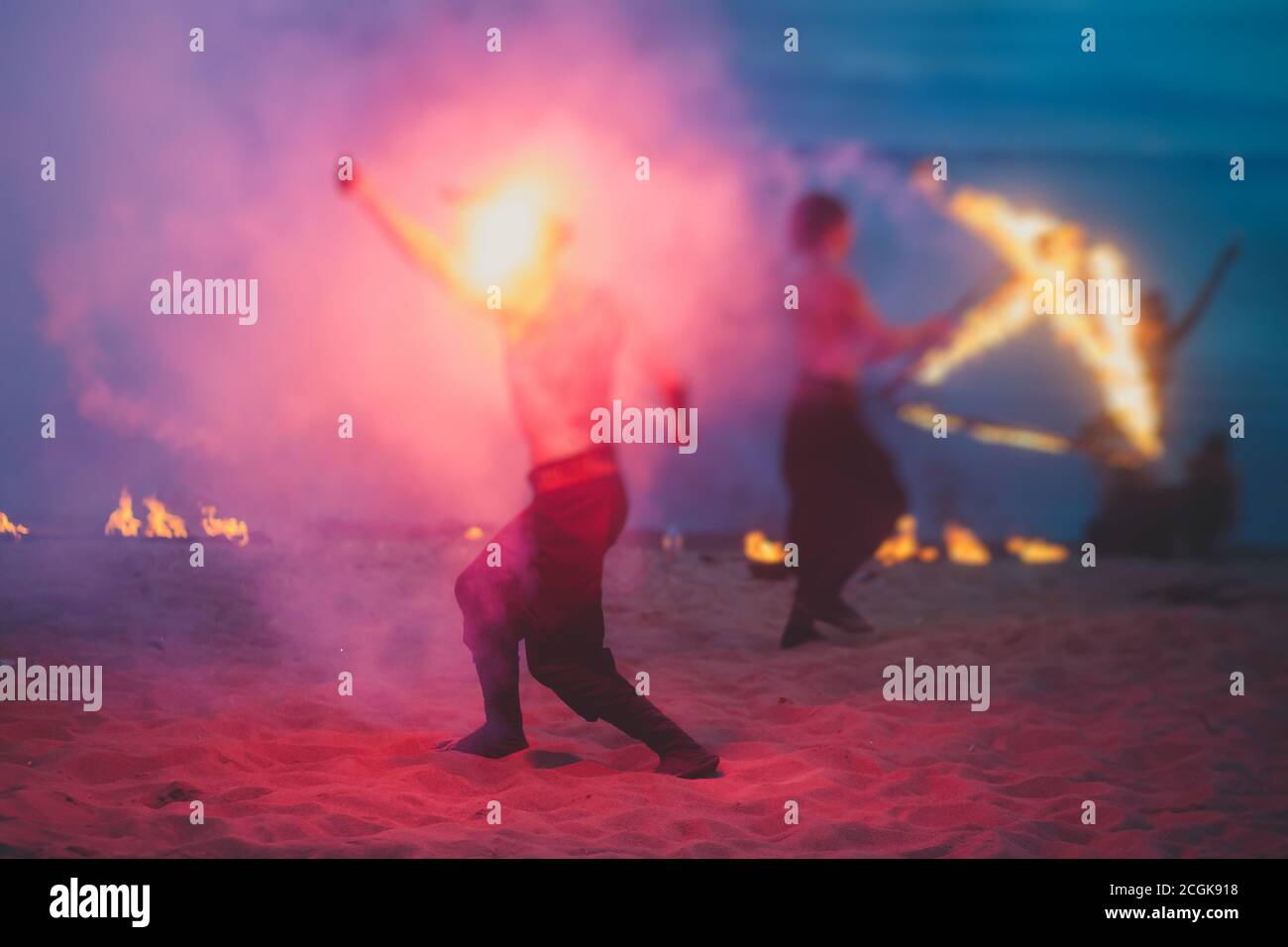 Group of fire artists fakir perform amazing show at night with
