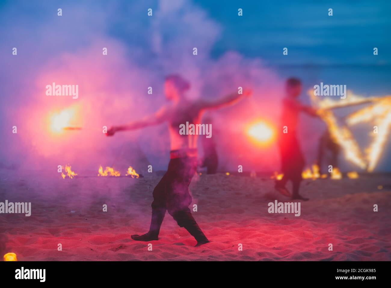 Group of fire artists fakir perform amazing show at night with