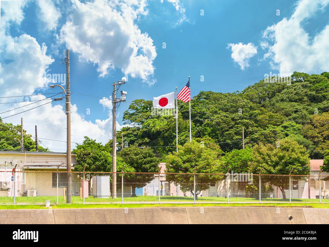 yokosuka, japan - july 19 2020: National flags of Japan and United States of America on the Azuma Island separating the Japan Self Defence Fleet from Stock Photo