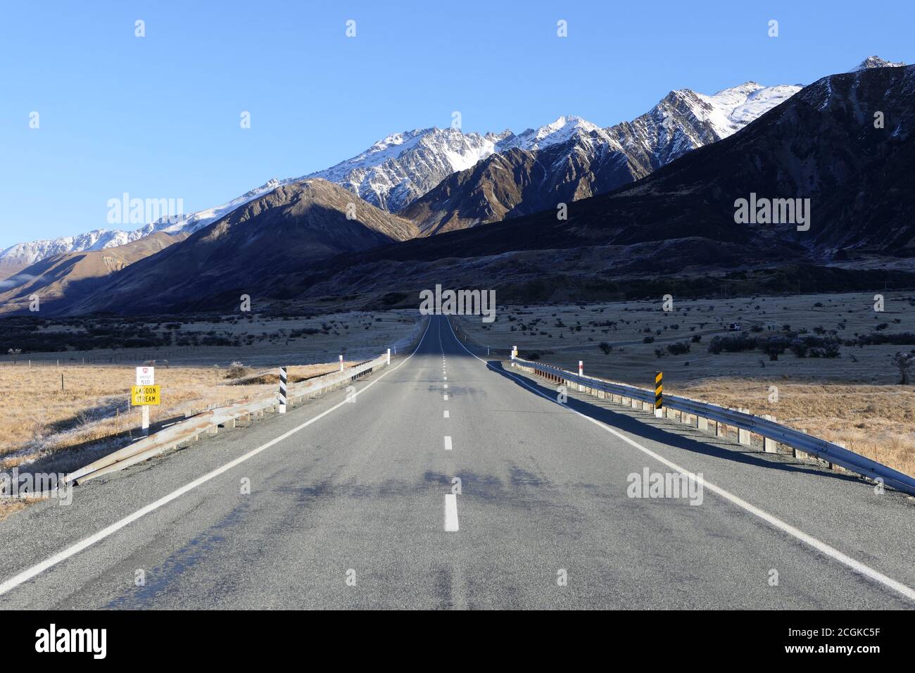 Scenic road to the Mount Cook National Park or Aoraki National Park on a beautiful winter day Stock Photo