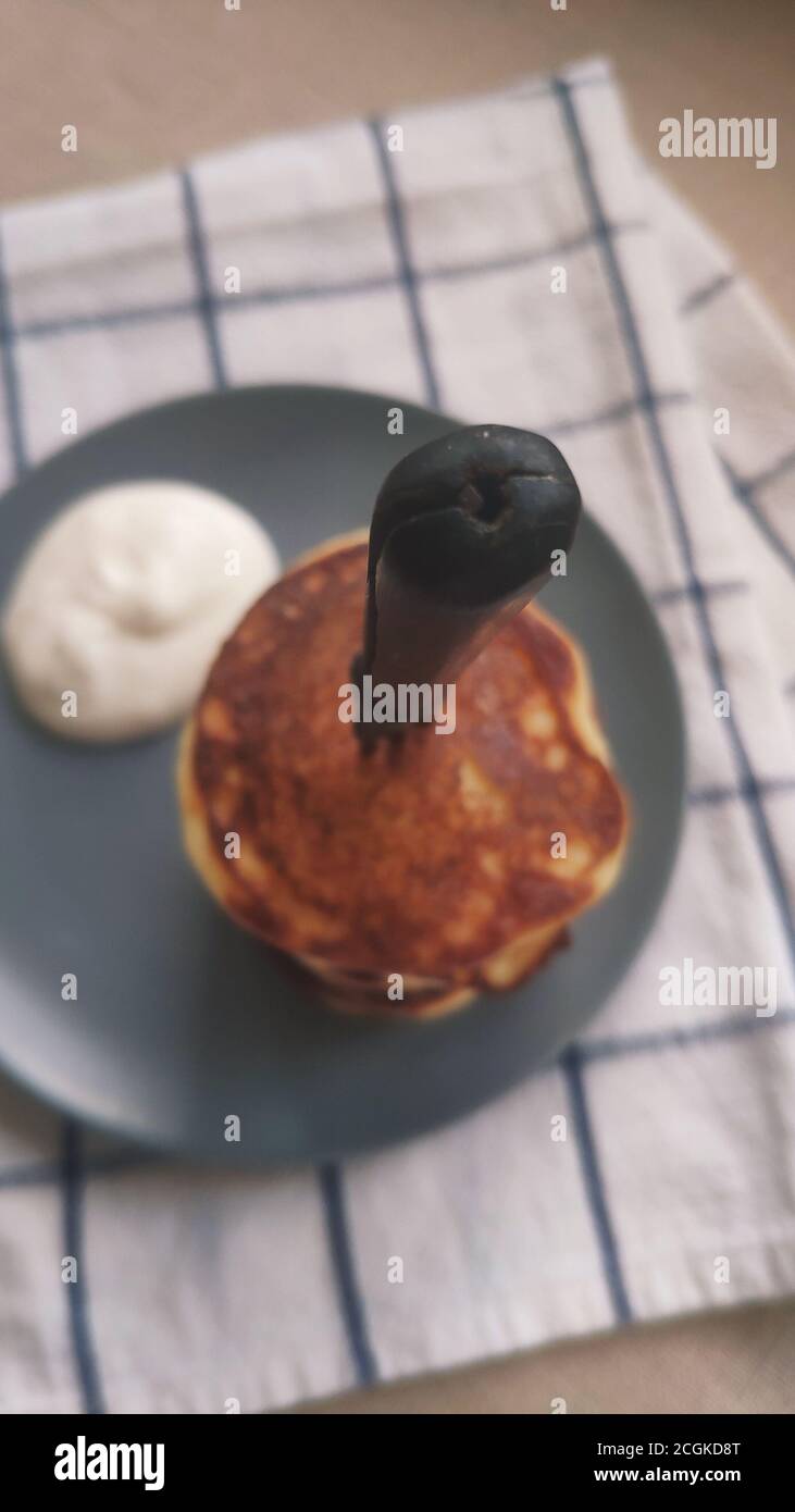 Plate with stack of pancakes and vintage fork, selective focus Stock Photo