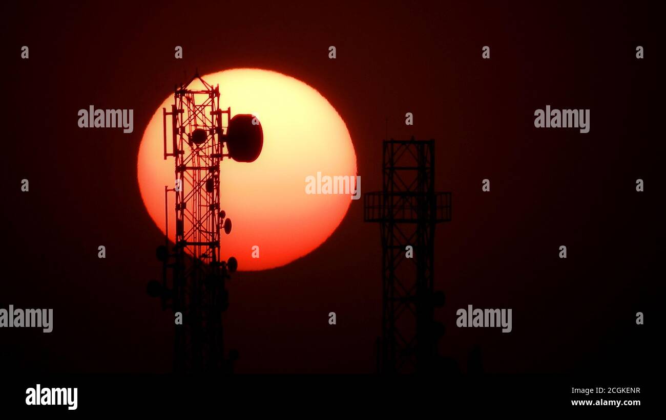 Silhouette of telephone tower Stock Photo